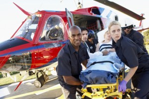 Paramedics unloading patient from Medevac